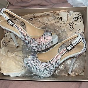White guess shoes never worn. Custom made with Swarovski crystals